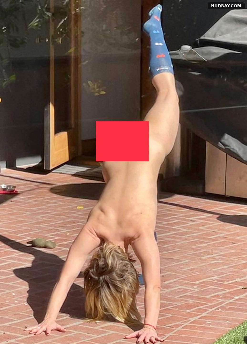 Kristen Bell attempting a nude headstand May 09 2021