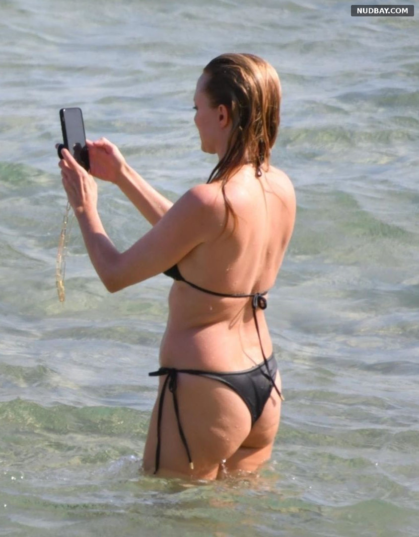 Heather Graham Booty Wearing Bikinis in Sardinia Jul 22 2021
