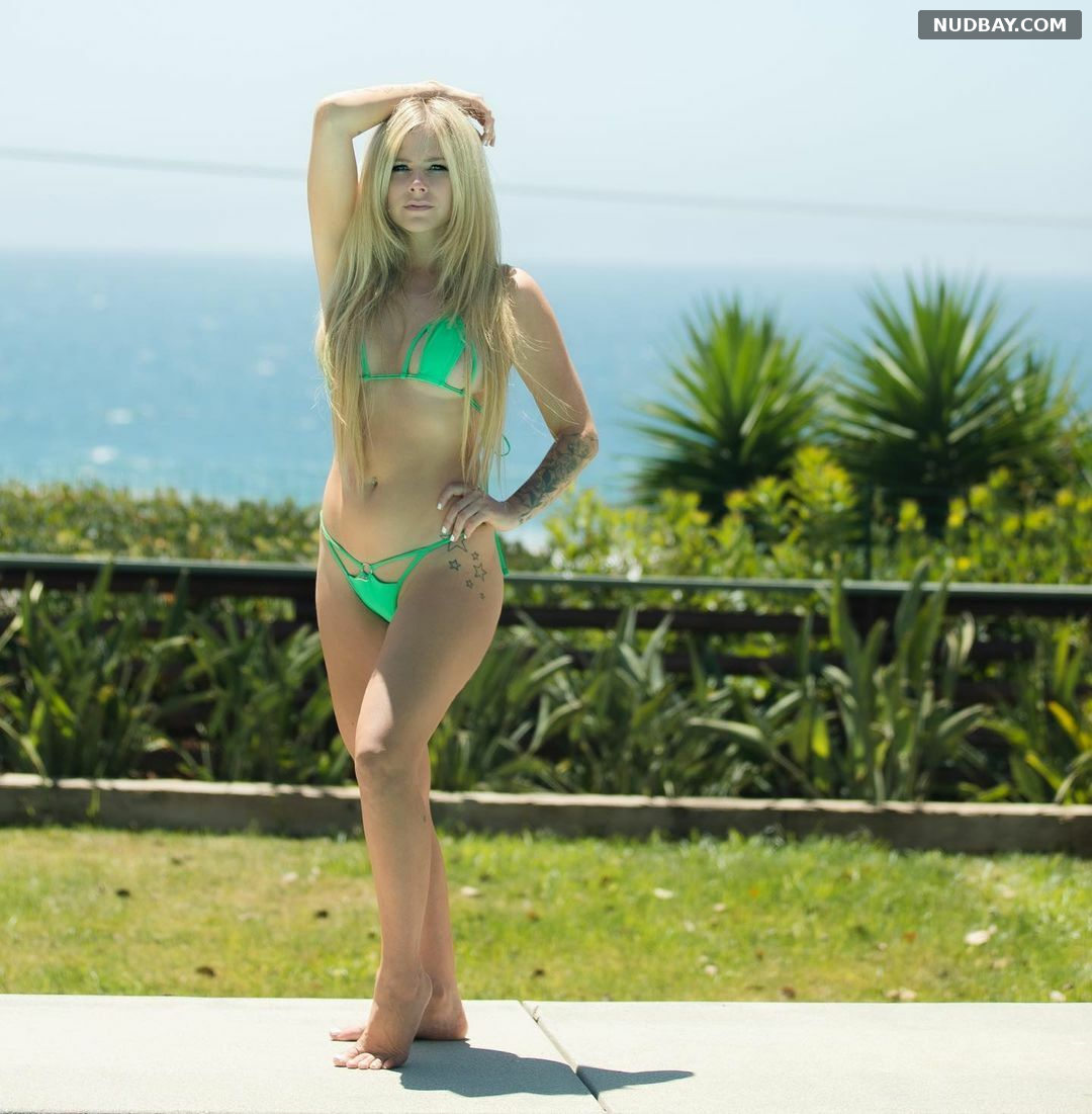 Avril Lavigne nude wearing a green bikini Aug 17 2021