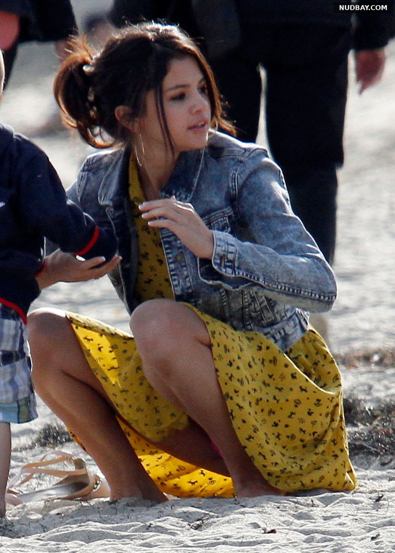 Selena Gomez upskirt crotch on the beach Feb 17 2012