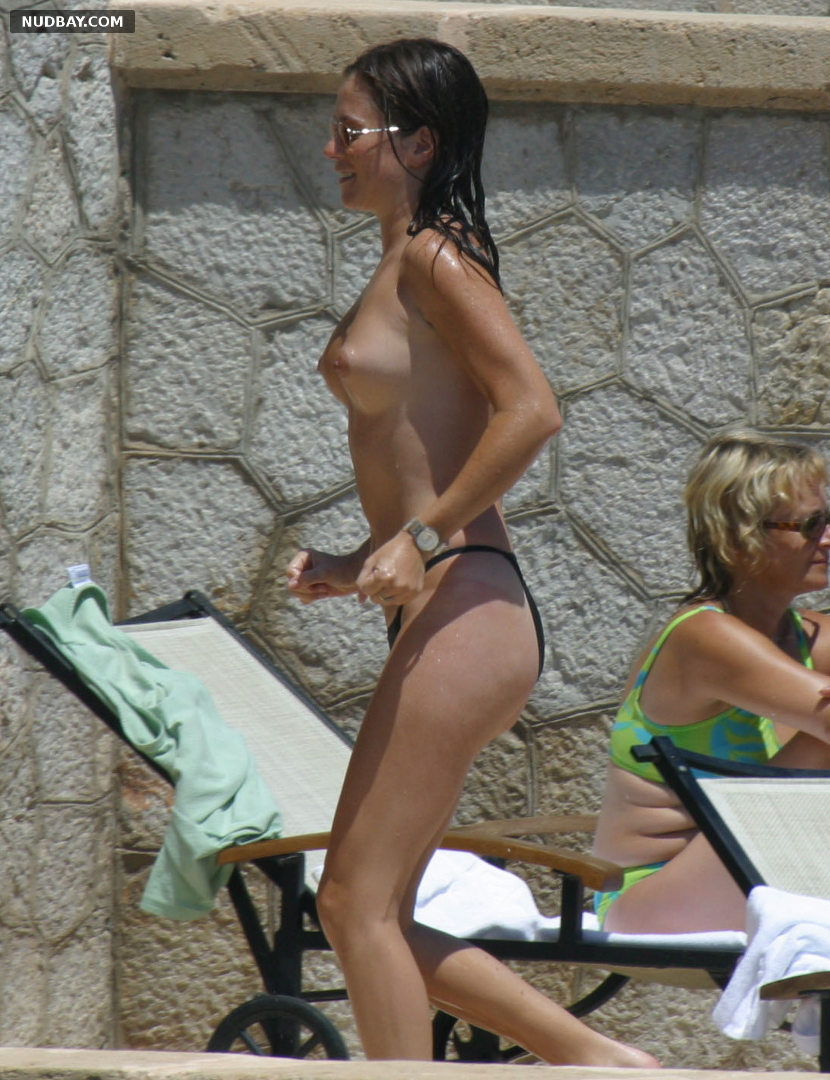 Anna Friel nude side tits on the beach in Bikini 2007