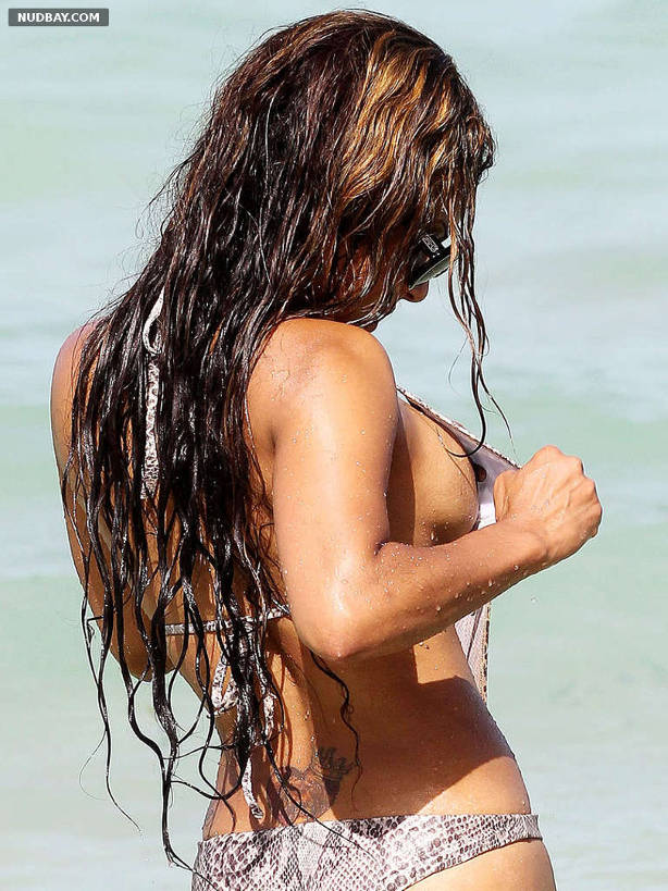 Christina Milian nip slip on the beach vacation 2012 01