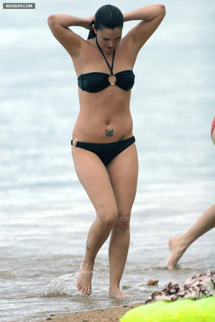 Drew Barrymore nude wears black bikini on the beach 2007