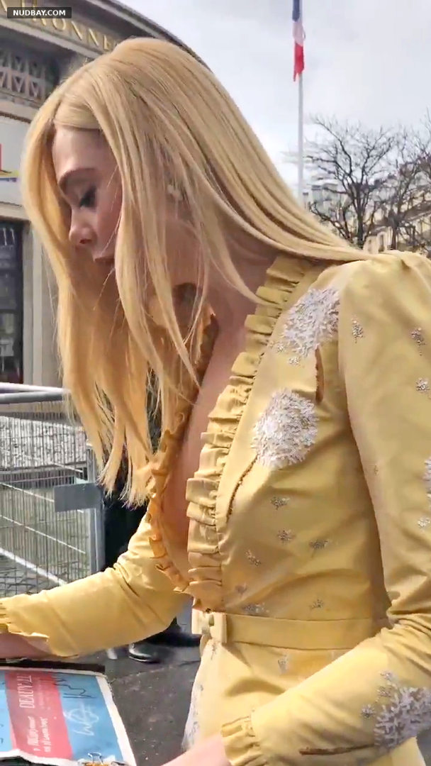 Elle Fanning NIp slip at the Miu Miu Fashion Show in Paris 2018