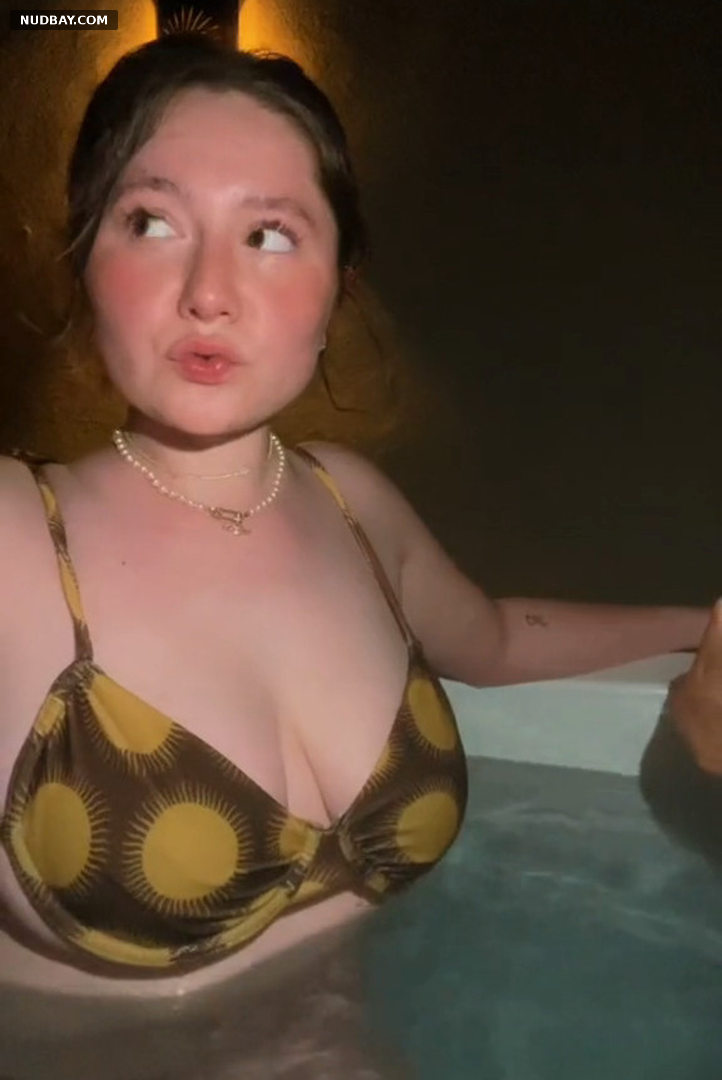 Emma Kenney nude big tits in a bikini in a hot tub 2022
