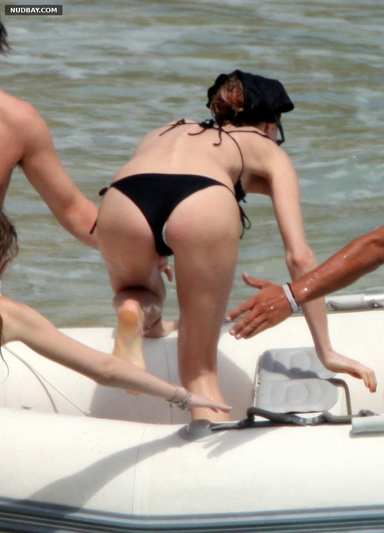 Eva Herzigova nude ass wears black bikini on the beach 2007