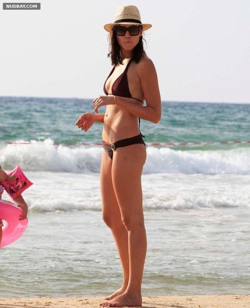 Gal Gadot naked in a bikini on the beach 2008