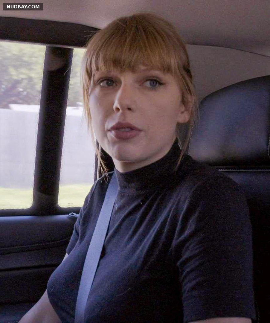 Taylor Swift nude sits in the car in a sexy sweater 2021