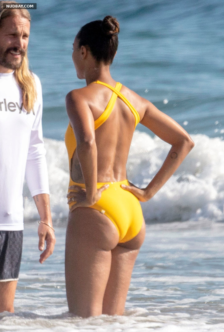 Zoe Saldana naked wears yellow swimsuit in Malibu California 2020