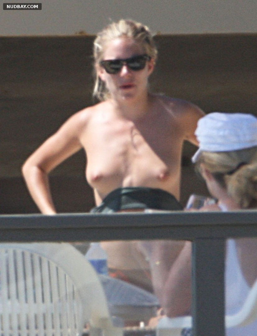 Sienna Miller nude shows boobs on vacation 2013